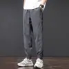 Calça masculina elástica na cintura, transfronteiriça, leve, slim fit, comprimento no tornozelo, moderna, adequada para o verão, adolescentes e estudantes, uso casual