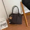 Bolso de mano retro elegante transfronterizo para mujer, nuevo bolso cruzado tipo cubo casual de moda, bolso de hombro cruzado para mujer trabajadora