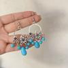 Pendientes colgantes de piedra de pino de estilo nacional retro bohemio europeo y americano transfronterizos, pendientes con borlas huecas, venta directa de fábrica