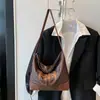 Bolso de Mano de Moda Retro para Mujer 2026 Primavera Nuevo Estilo Retro Simple Gran Capacidad Ropa de Trabajo Bolso de Hombro Cruzado