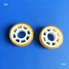 Acessórios relacionados à máquina de gravação de PCB incluem uma roda com 40 mm de diâmetro externo, produtos plásticos, peças plásticas e uma roda revestida.