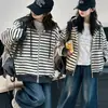 Abrigo de Otoño para Niñas 2026 Nuevo Modelo Camiseta Rayada Infantil Cárdigan con Capucha Holgado de Moda para Niños Mayores Ropa de Abrigo Tendencia