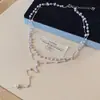 Collar de borlas de perlas y cuentas transfronterizo europeo y americano de doble capa, cadena para la clavícula elegante y versátil, gargantilla de lujo ligero y de alta gama