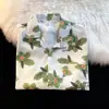 Camisa de solapa de manga corta de verano 2025, moderna, estilo Ins japonés, retro, casual, holgada, con estampado de flores hawaianas, camisa fina