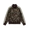 Chaqueta retro americana con estampado de leopardo y patchwork de rayas, cuello alto, una prenda exterior moderna y holgada para hombres y mujeres, perfecta para parejas y fácil de combinar con cualquier atuendo.