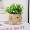 Venta al por mayor transfronteriza de muñecas creativas de cara sonriente con plantas en maceta para decoración de hogar, oficina, estudio, escritorio y adornos