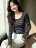Top de base a rayas para mujer, nuevo estilo coreano, otoño e invierno, sentido del diseño, versátil, elegante, manga larga de otoño e invierno, cuello medio abierto, top ajustado
