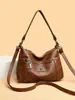 Bolsa Feminina Modelo Novo 2026 para Comércio Exterior, Bolsa Mãe de Couro Macio, Bolsa de Ombro Transversal para o Braço, Bolsa de Mão Simples e Elegante para Mulheres de Meia-Idade