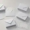 Venta al por mayor en stock sobres pequeños estilo europeo blanco puro, tarjetas de membresía, tarjetas de felicitación, sobres blancos triangulares estilo europeo autoadhesivos en blanco