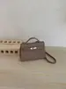 Bolso de Mano de Alta Gama Transfronterizo para Mujer 2026 Nuevo Retro Moda Versátil Bolso Kelly al por Mayor Bolso de Hombro Cruzado