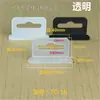Gancho para agujero de avión hebilla de triángulo de plástico embalaje en caja de color gancho de plástico caja de papel plana tridimensional oreja colgante hebilla colgante