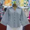 Moda Femenina Transfronteriza Europea y Americana Primavera 2026 Nuevo Estilo Elegante Diseño de Nicho Cuello Camisero Holgado Top de Camisa Rayado