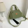 Moda Transfronteriza casual retro bolso mujer casual todo-partido bolso de hombro para mujer gran capacidad multibolsillo color liso bandolera