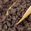 Té fósil Pu'er al por mayor té Pu'er fragante glutinoso té cocido Yunnan plata rota cabeza de té viejo té suelto 500g té