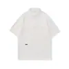 Ropa de Hombre Xintang Camisa polo de retazos estilo americano para hombre, fina de verano, fresca y transpirable, corte holgado, top de manga corta