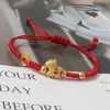 Popular Año del Caballo, el Año del Zodiaco, Tendrás Dinero Inmediatamente. Pulsera trenzada de cuerda roja. Pulsera Nueva de Año Nuevo Igual a la de Mini Fuma Gold Shop