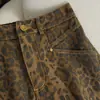 Falda corta de mezclilla camuflaje estilo americano para mujer, nueva primavera/otoño 2026 cintura alta línea A corte ajustado ropa de trabajo falda sexy