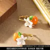 Pendientes de Flor de Caqui con Goteo de Aceite Fresco, a la Moda y Exquisitos, Estilo Coreano, con un Toque Lujoso y de Alta Gama
