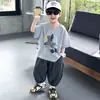 0439 Conjunto de Verano para Niños 2026 Nuevo Estilo Conjunto Ropa de Moda de Manga Corta para Niños Pantalones Rayados Frescos de Verano Conjunto de Dos Piezas