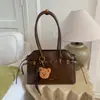 Bolso de Mano Retro de Moda Transfronterizo 2026 para Mujer con Acabado de Lujo, Diseño de Nicho, Bolso de Hombro Bajo el Brazo, Bolso Tote, Moderno