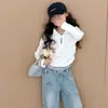 Camisetas Cortas para Niñas Transfronterizas 2026 Nuevo Estilo Camisa Básica de Niños con Cuello Camisa Falsa de Dos Piezas Camiseta de Moda Atuendo de Primavera