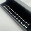 Nuevo modelo popular, incrustado con zirconia de gran quilate, pulsera de trébol de cuatro hojas de diamantes completos empalmados, joyería de moda de lujo ligero de alta gama
