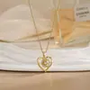 Colar para Mulheres, Flor de Zircônia Bauhinia Giratória da Moda Nicho Moda Novo Design Pingente Titânio Aço Colar de Temperamento