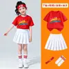 Roupa de uniforme para apresentação do Dia das Crianças: camiseta de manga curta e saia plissada com tema patriótico vermelha para meninas
