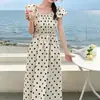 Vestido de Verano Nuevo Dulce y Juvenil con Bloques de Color, Lunares y Mangas Abullonadas con Lazo Adelgazante para Mujer de Aliexpress Europeo y Americano