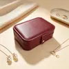 Bolsa portátil para joyas para viajes transfronterizos, caja de almacenamiento de joyas de cuero PU, caja de almacenamiento hecha a mano a prueba de polvo para anillos y pendientes con cuentas