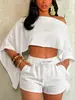 Conjunto cruzado europeo y americano para mujer 715, sexy estilo vacacional playero con top de hombros descubiertos y shorts con bolsillo