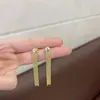 Pendientes Elegantes de Moda de Gama Alta de Nicho Accesorios para Orejas Tendencia Gymnopus Pendientes Largos con Borlas Brillantes para Mujer