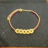 Pulseira de Fio Vermelho com Moedas dos Cinco Imperadores Efeito Gelo Brilhante Banhada a Ouro Estilo Xiaohongshu, Pulseira Trançada de Luxo Leve para Mulheres, Fonte para Transmissão ao Vivo