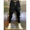 Pantalones deportivos populares de marca de celebridad de Internet para hombre, corte ajustado, hasta el tobillo, para hombre, otoño e invierno 2022