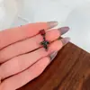 Dulce Fresca Chica Picante Serpiente Enroscada Cruz Hueso de la Oreja Clavo de Oreja Nicho Diseño de Sentido Avanzado Pendientes Europeos y Americanos Pendientes Elegantes de Moda