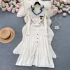 Estoque Disponível Fornecimento Transfronteiriço Vestido Longo Gola Polo Letras Bordadas Mangas Longas Elegante Barra Larga Roupas Femininas Vestido 2025 para Mulheres