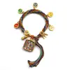 Pulseira do deus da riqueza de cinco vias estilo Xizang oito santos padroeiros cinco mestres Manjushri deus da riqueza amarelo thangka corda tecida à mão pulseira do ano desta vida
