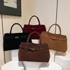 Bolso de mano y hombro de ante retro versátil de diseño transfronterizo, mismo estilo que los bolsos de influencers populares