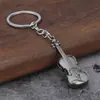 Directo de fábrica retro guitarra violín metal llavero joyería transfronteriza venta al por mayor colgante colgante