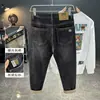 Calça jeans masculina nova de outono 2024, slim fit, pequena, reta, bordada, lavada, coreana, moderna, para todos os gostos, calça de vaca