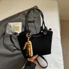 Bolsa Saco Bordada Simples Retrô 2025 Outono e Inverno Nova Moda Versátil Bolsa de Ombro Bolsa Transversal de Nicho para Mulheres