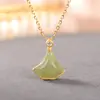 Luxo leve S925 prata de lei jade natural Hetian jade branco jade folha de ginkgo personalidade feminina banhado a ouro conjunto de pingente corrente