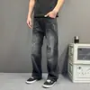 Jeans rectos holgados retro desgastados con patrón de relámpagos y bigotes para hombre y mujer, pantalones largos casuales americanos rectos holgados de marca moderna