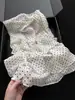Verão 2026 Novo Estilo/Saia de Bolinhas Chiffon Drapeada Meia Saia Feminina Irregular Camadas Saia Evasê Comprimento Médio Tendência