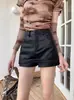 Saia midi de couro PU estilo garota ousada feminina 2027 primavera petite cintura alta plus size justa ao corpo saia curta preta versátil em A