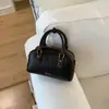Bolsa de Mão Fashion Bag Bowling Bag para Mulheres 2026 Início da Primavera Nova Estilo Coreano Bolsa de Ombro Simples Design de Nicho Bolsa Transversal para Mulheres
