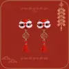 Pendientes de felpa de danza del león de moda para mujer, nuevo estilo 2026, aspecto de alta gama, perfectos para invierno.