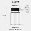 En stock gorra negra botella de plástico transparente PET botella dispensadora de boca ancha 30ml botella de medicina botella selladora para cápsulas y caramelos
