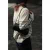 Suéter de punto a rayas color block estilo francés para mujer, holgado y estilizado, top versátil de cuello redondo, adecuado para usar en capas en otoño e invierno