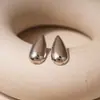Pendientes Colgantes de Acrílico Brillantes con Forma de Gota de Agua y Aguja de Acero Pendientes de Botón de Lujo de Gama Alta Moda Transfronteriza Europea y Americana Pendientes Versátiles
